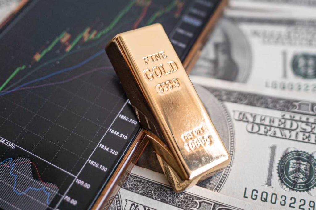 Gold prices rise, on track for second weekly gain on weaker dollar