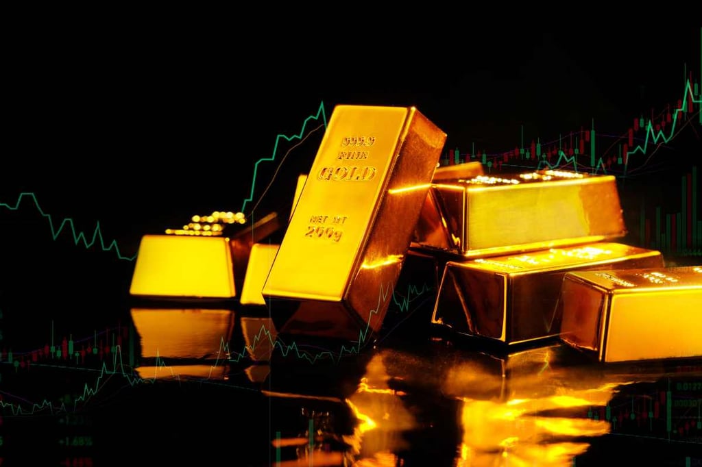 Gold prices hit record high of $2,440.49 on interest rate cut bets